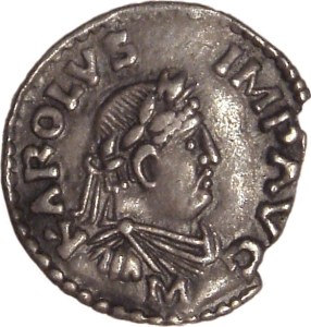 A coin of Charlemagne with the inscription KAROLVS IMP AVG (Karolus Imperator Augustus) from Wikipedia